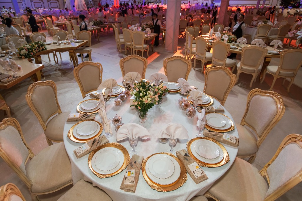 Intimate VIP dining hall under ambient candlelight